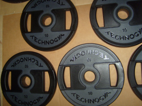 Диски для штанги б у 51 мм уретановые с хватами Technogym FD